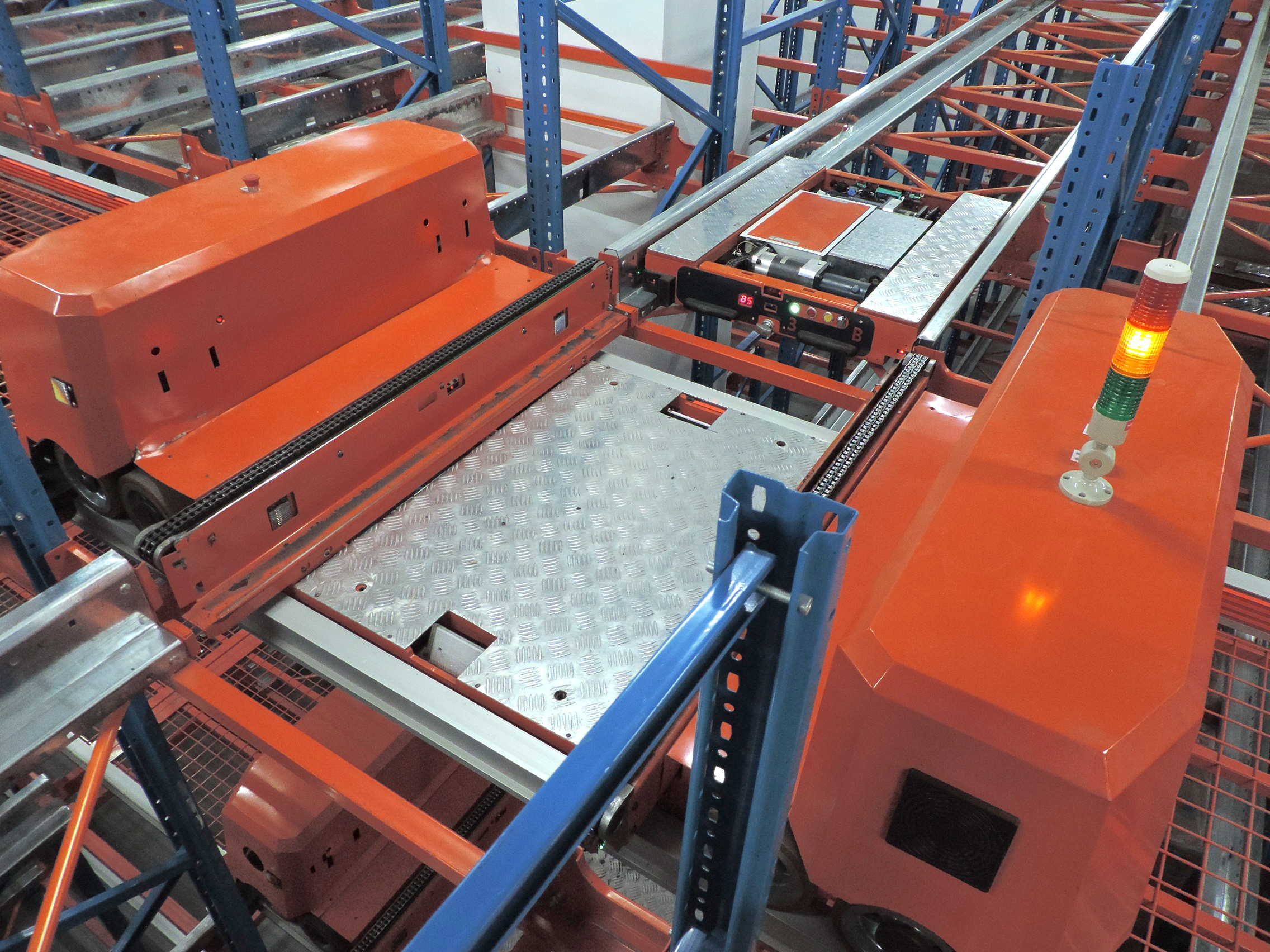 子母穿梭車自動化立體庫與一般穿梭車貨架有什么區(qū)別